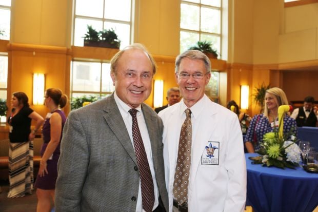 Dr. Robert Wilmott chair of pediatrics, Philip Alderson dean of medical school